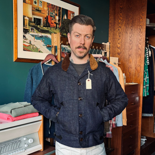 alex, store owner, weraing Mister Freedom Campus Blouse standing in the store