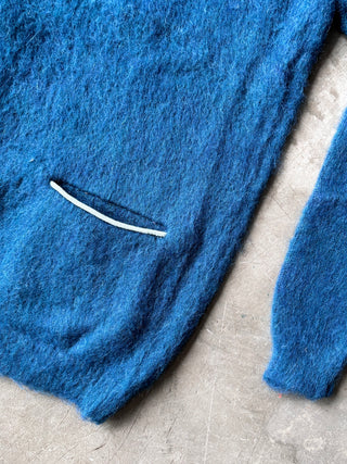 Pherrow's cardigan sleeve